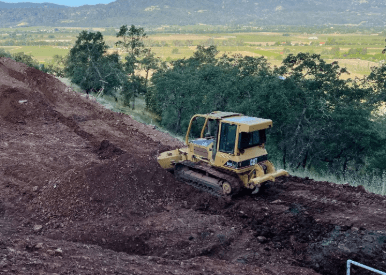 Bulldozer on hillside