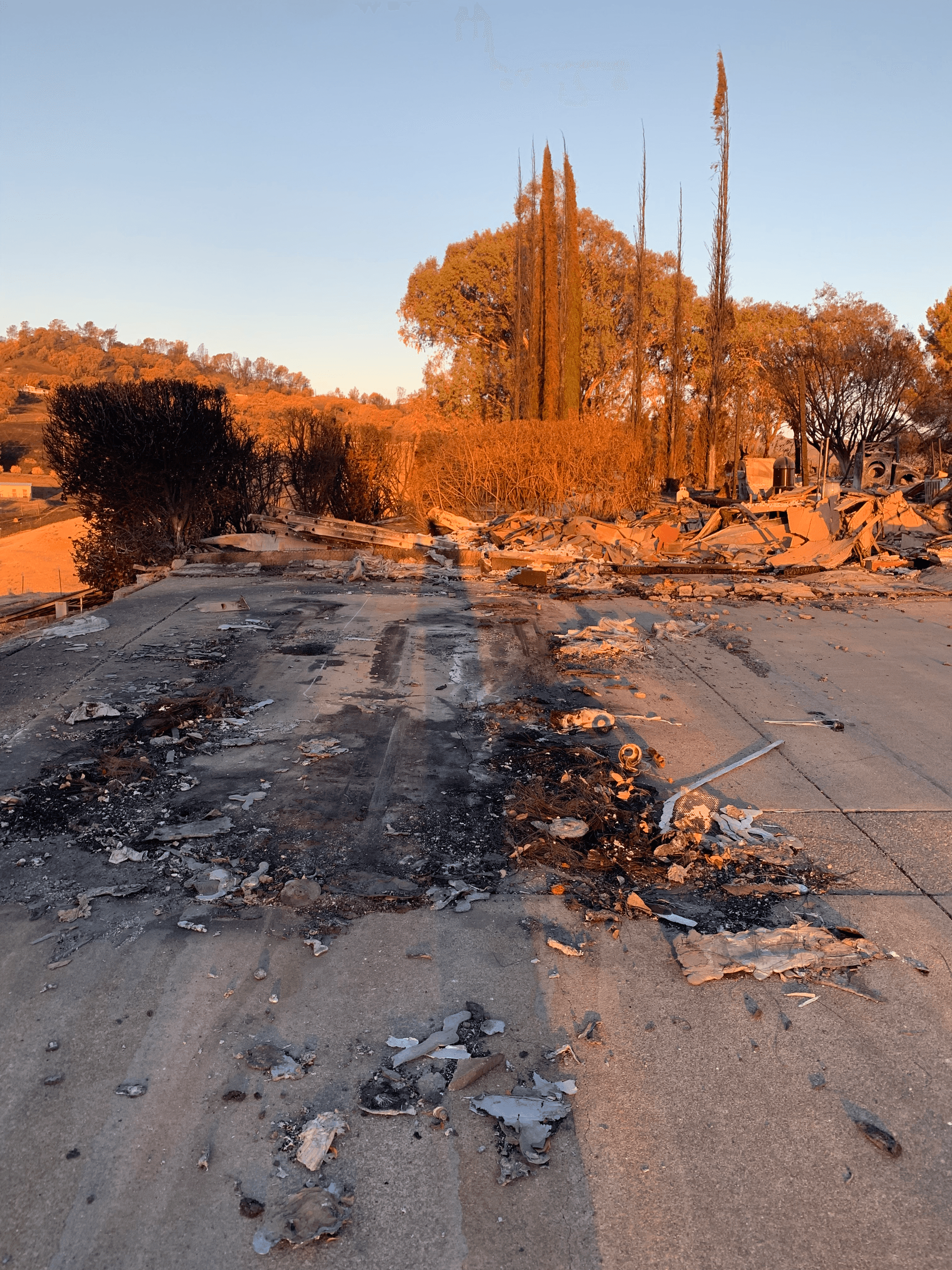 Excavator clearing debris